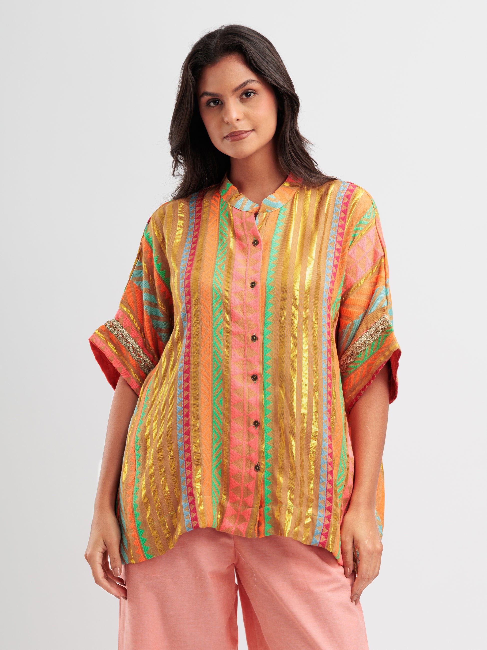 Amber Glow kaftan shirt featuring metallic gold stripes and vibrant geometric patterns.