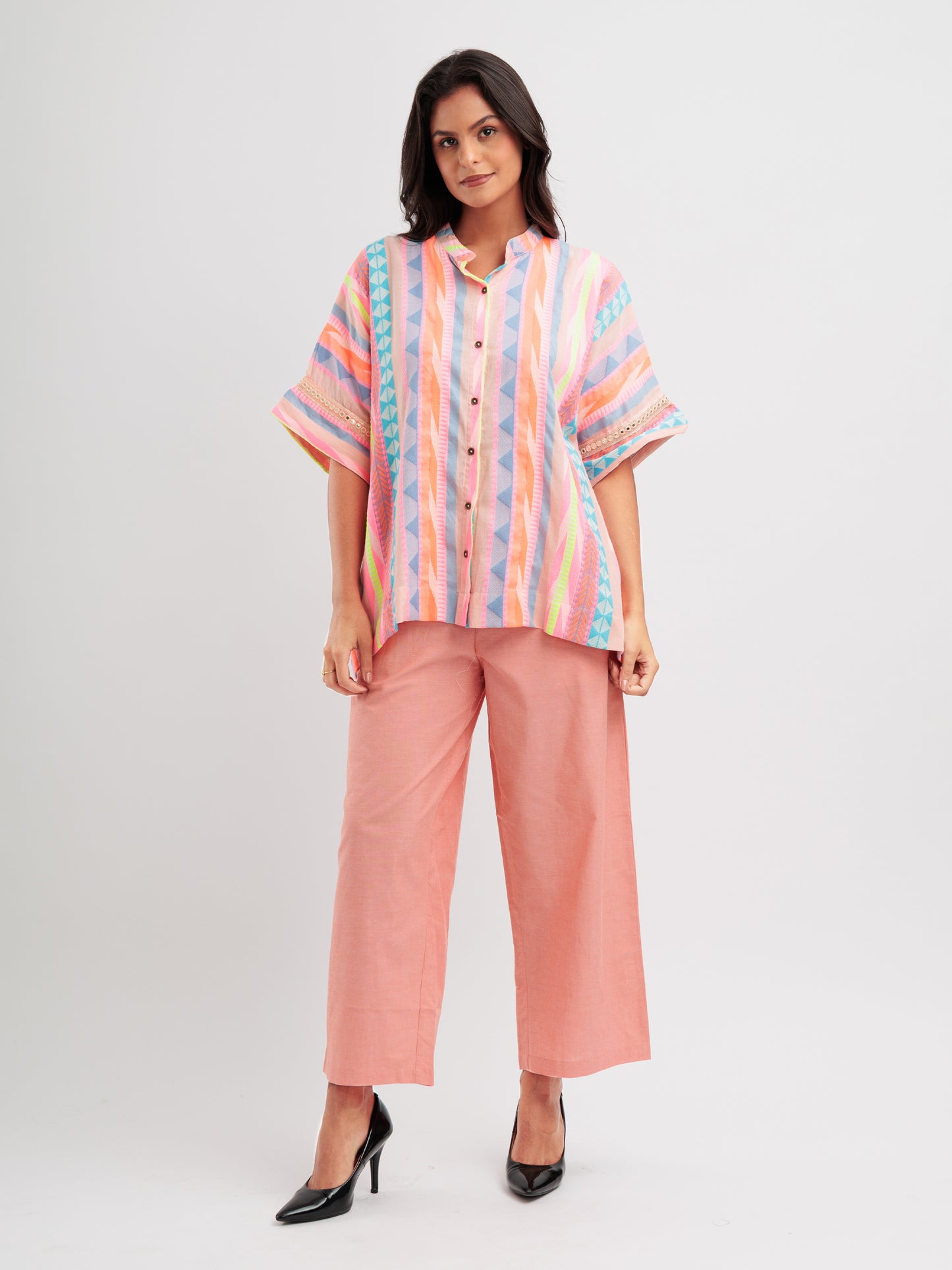 Radiant Rhythm kaftan shirt featuring multicoloured stripes and geometric lace on sleeve details.