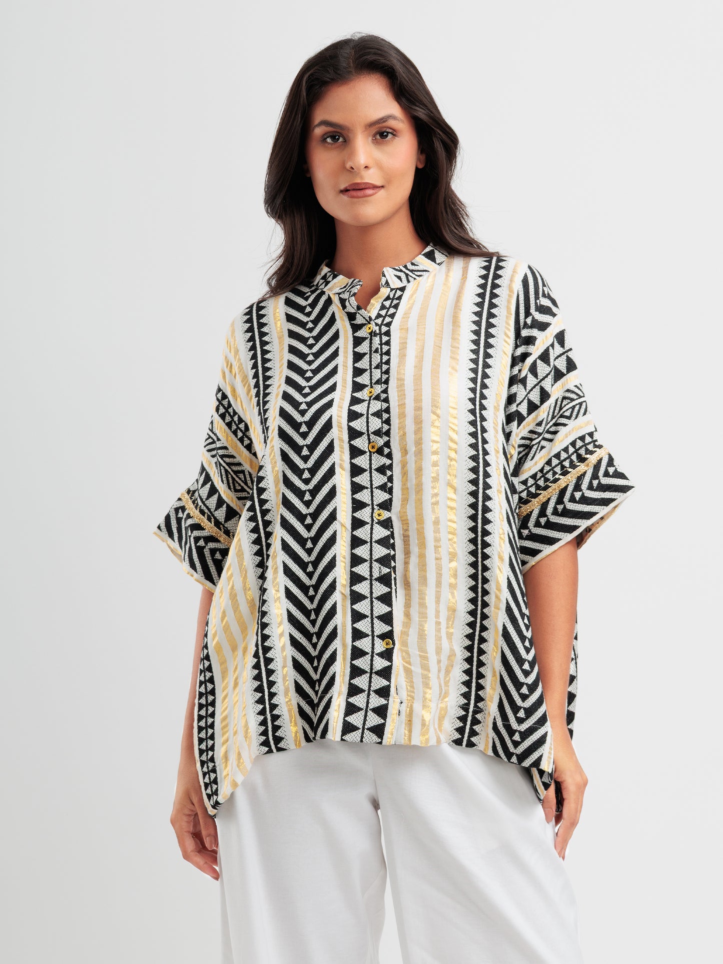 Geometric print kaftan shirt with metallic accents and mandarin collar, styled as Indian Fusion wear.