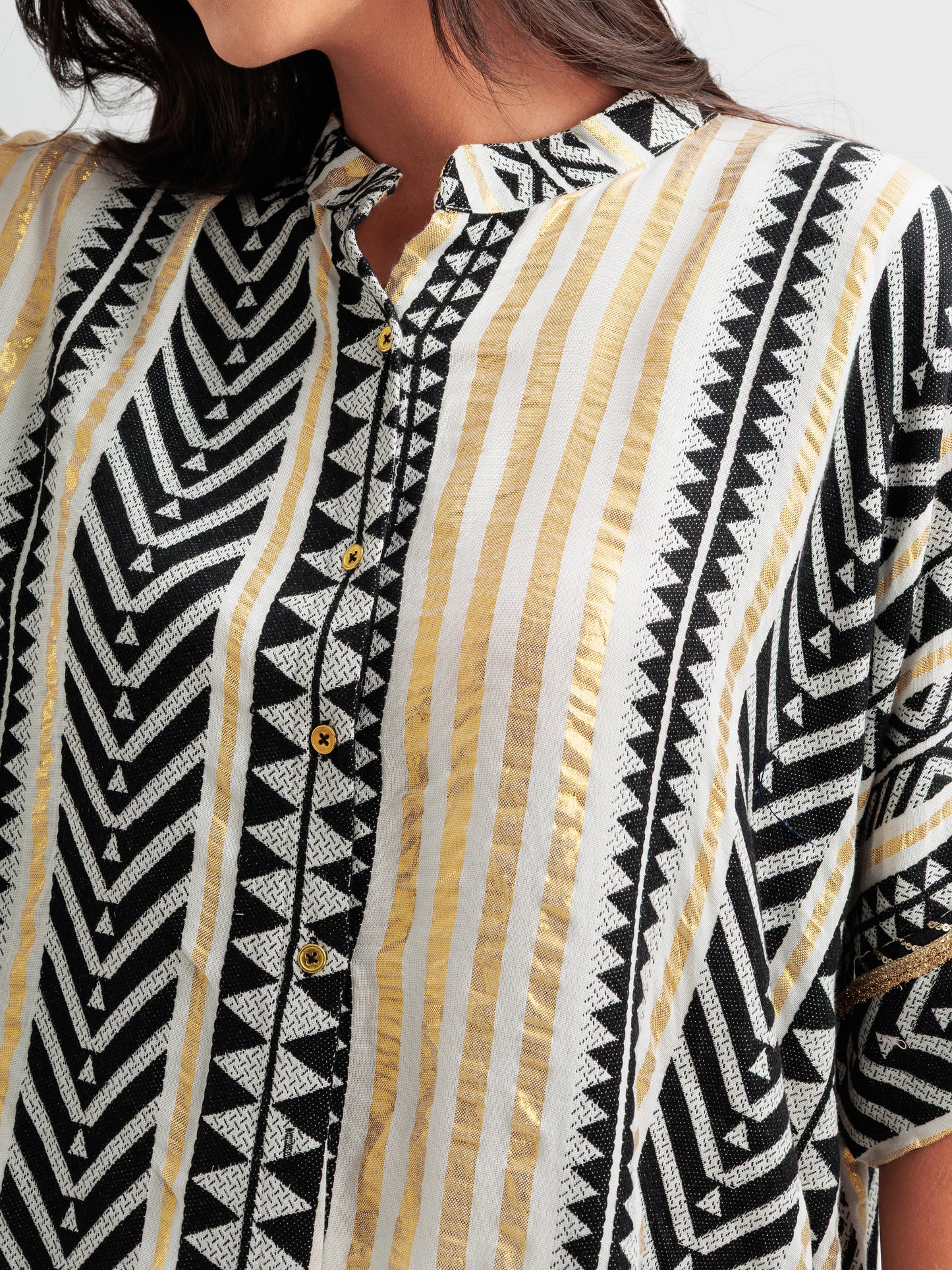 Geometric print kaftan shirt with metallic accents and mandarin collar, styled as Indian Fusion wear.