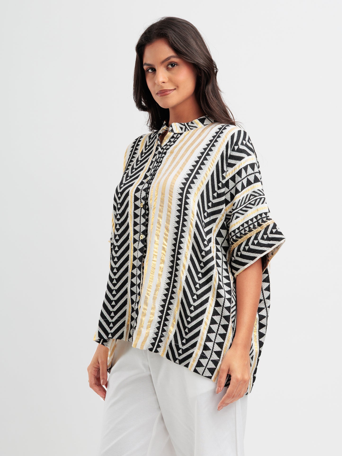 Geometric print kaftan shirt with metallic accents and mandarin collar, styled as Indian Fusion wear.