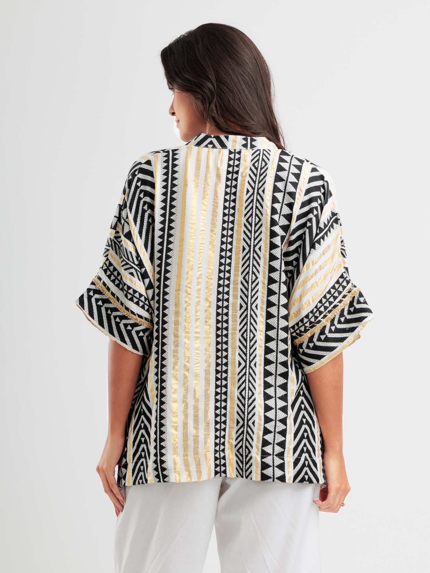 Geometric print kaftan shirt with metallic accents and mandarin collar, styled as Indian Fusion wear.