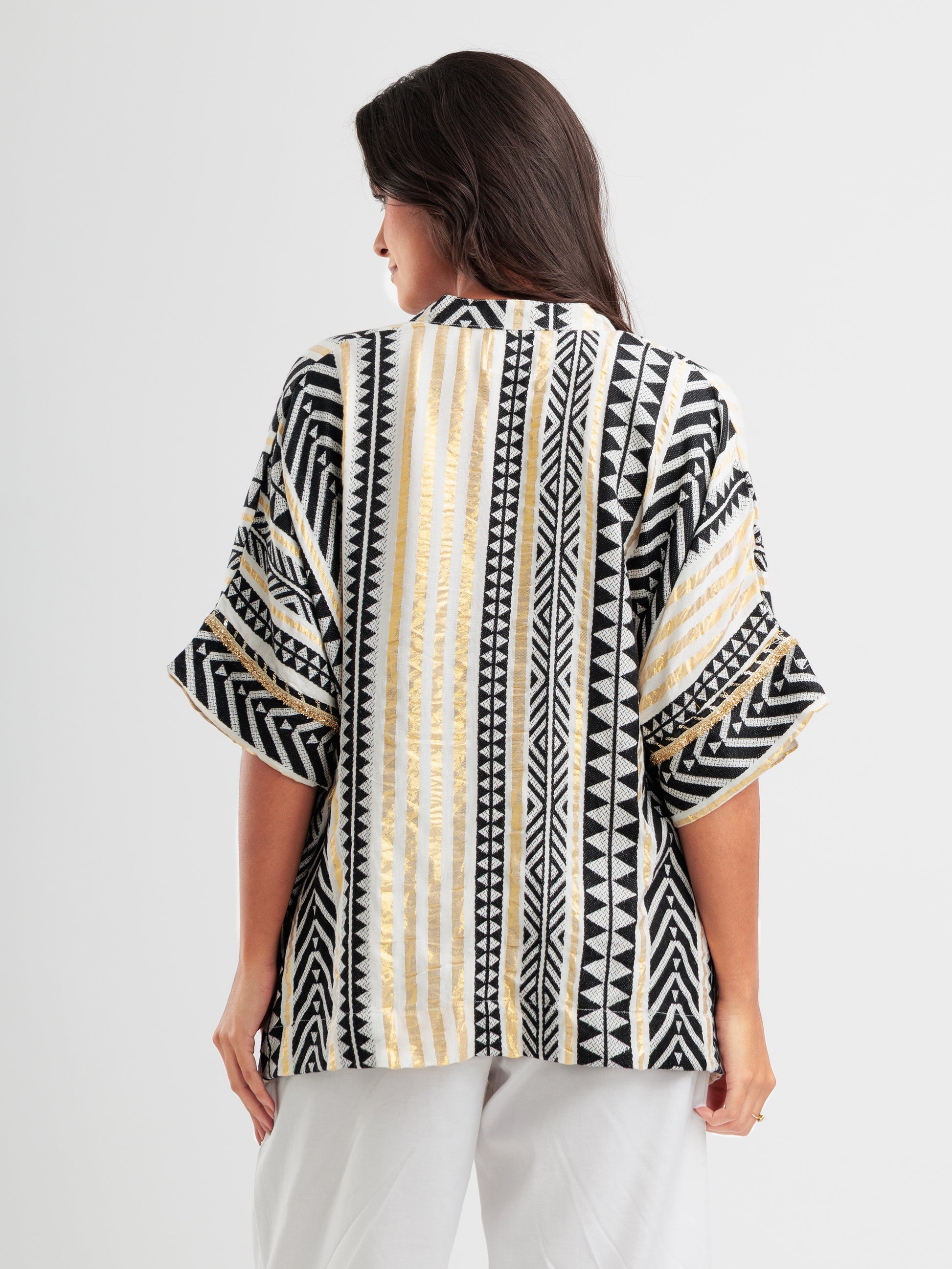 Geometric print kaftan shirt with metallic accents and mandarin collar, styled as Indian Fusion wear.