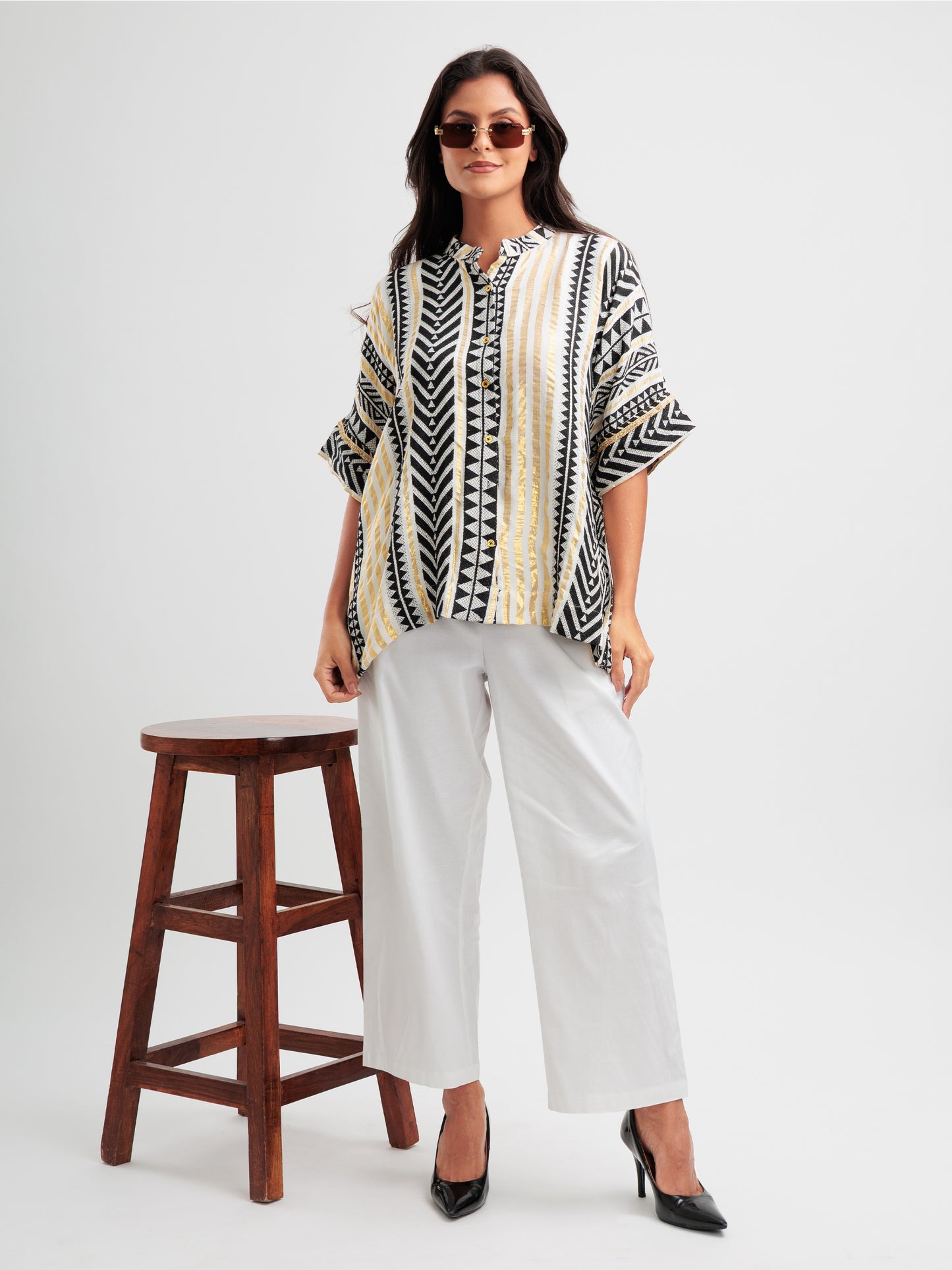 Geometric print kaftan shirt with metallic accents and mandarin collar, styled as Indian Fusion wear.